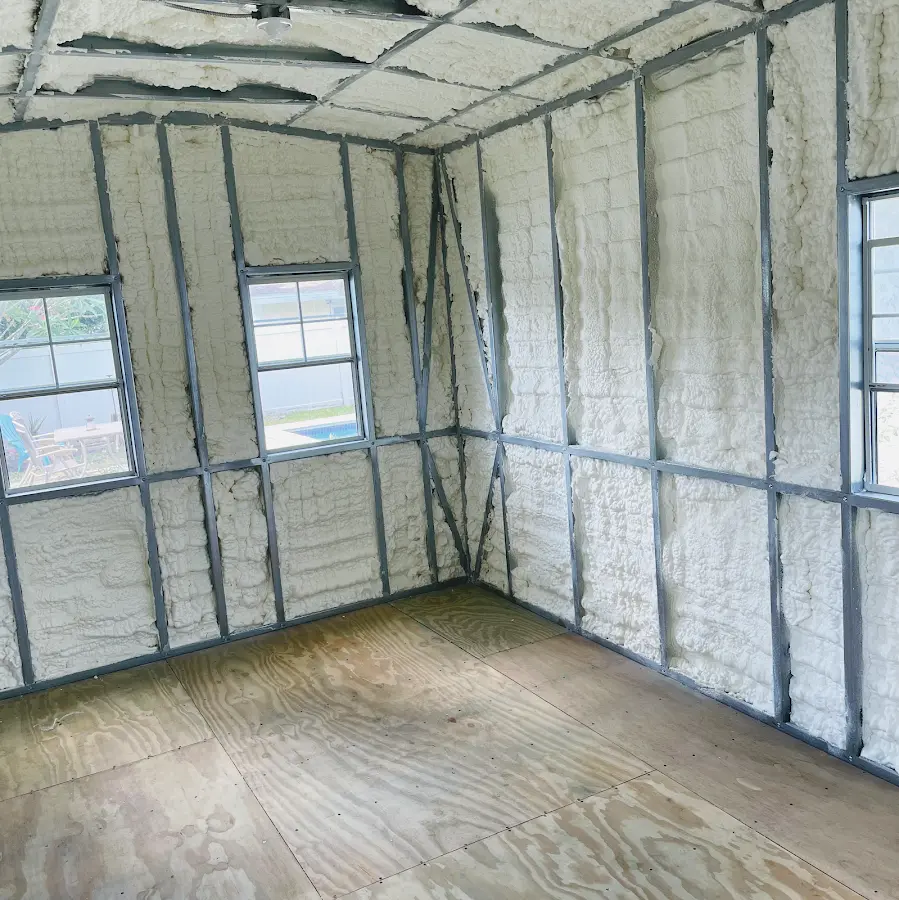 Closed-cell spray foam insulation applied to wall cavities in a residential project in Kapaa